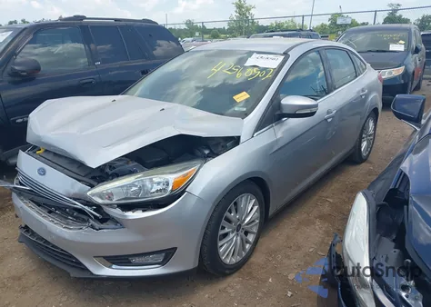 2016 Ford Focus Titanium из США, поврежденный, VIN 1FADP3J23GL301102